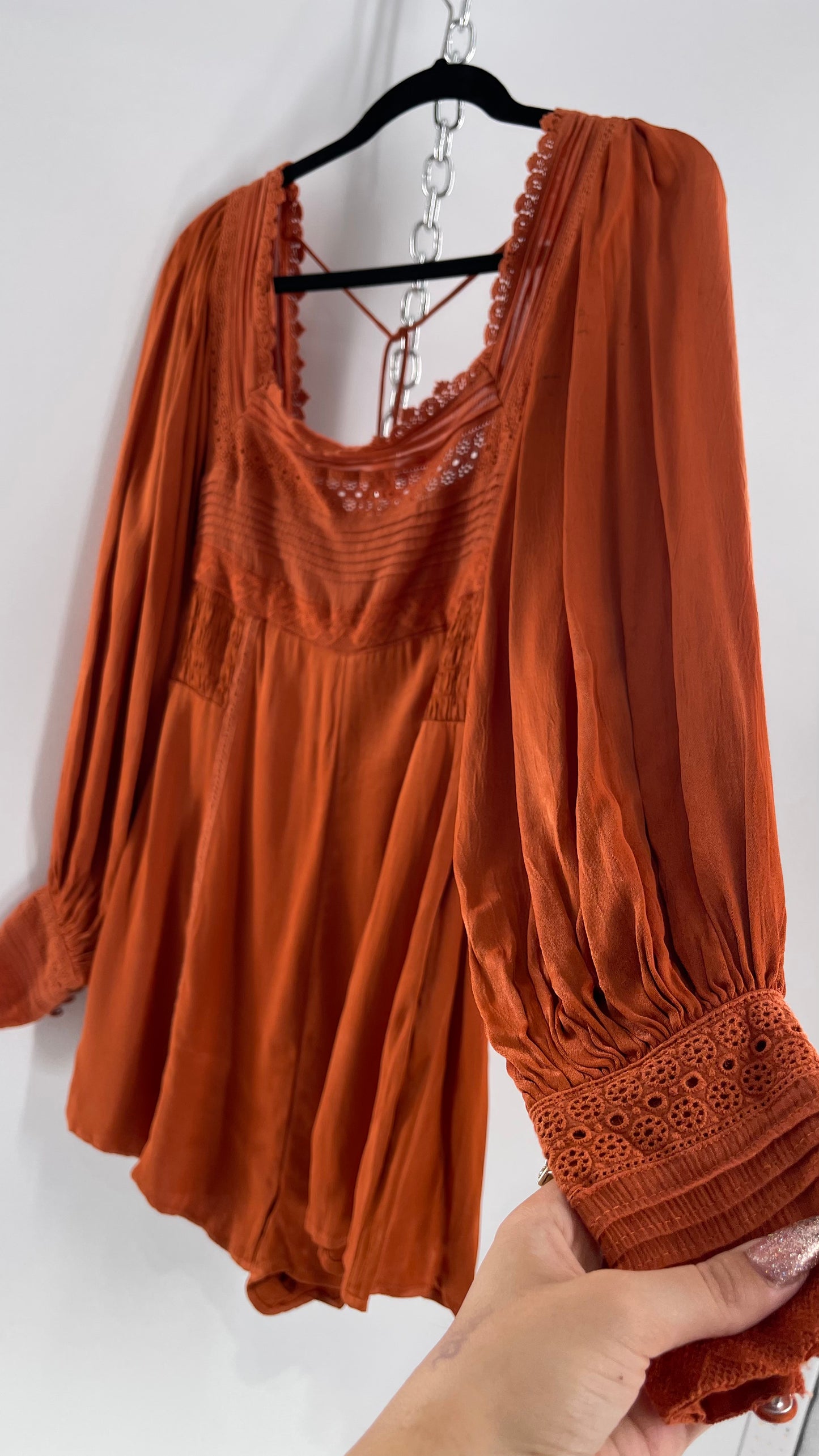 Free People Silky Orange Romper with Buttoned Sleeve Cuffs, Balloon Sleeves and Pleated Lace Bust (2)