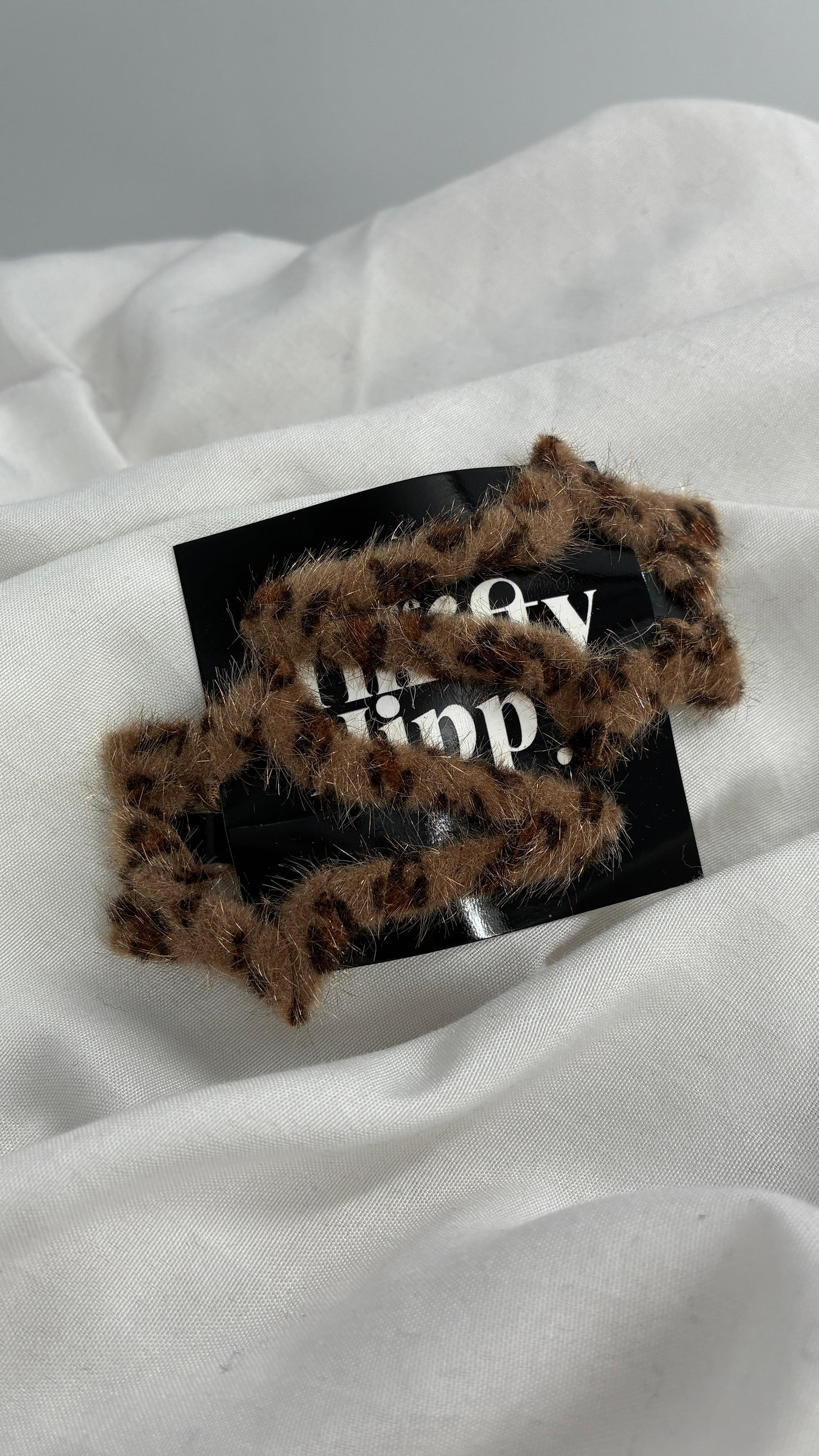 Fuzzy Cheetah Printed Shooting Star Hair Clips