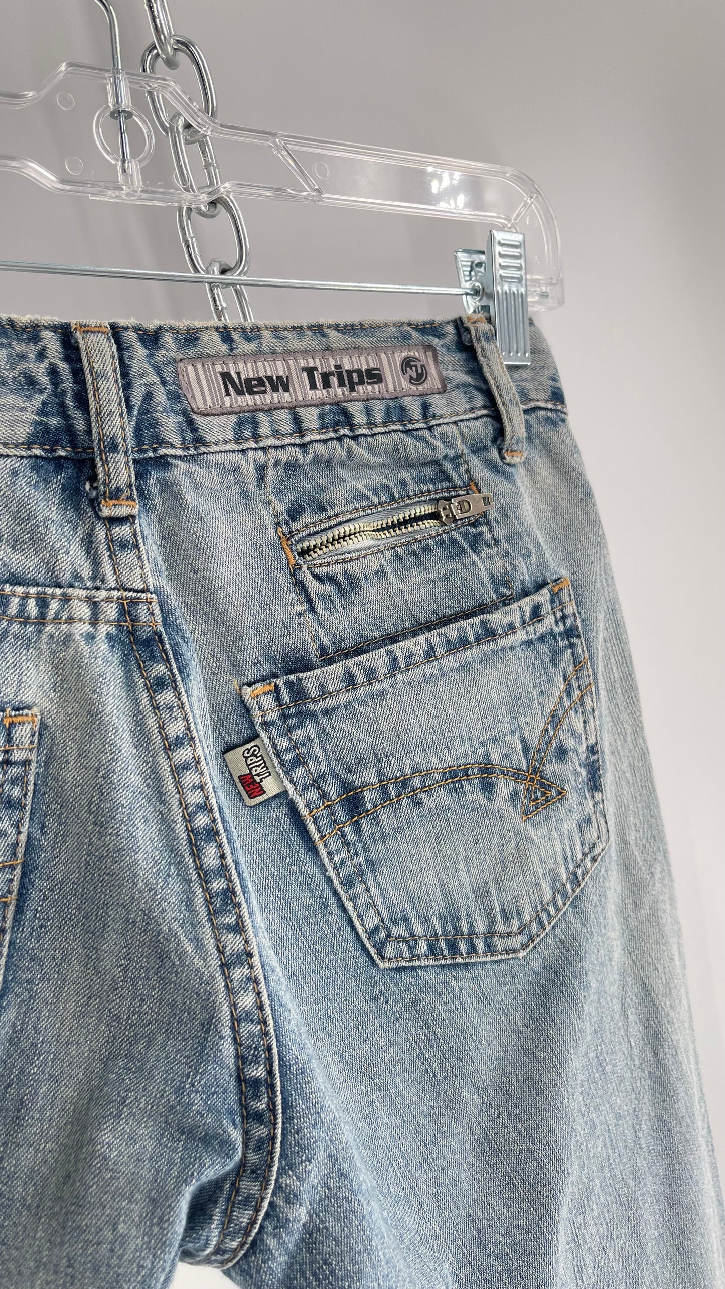 Vintage New Trips Light Wash Kick Flare Jeans with Zipper Hem Detail, V Waistline and Oversized Metal Buttons (40)