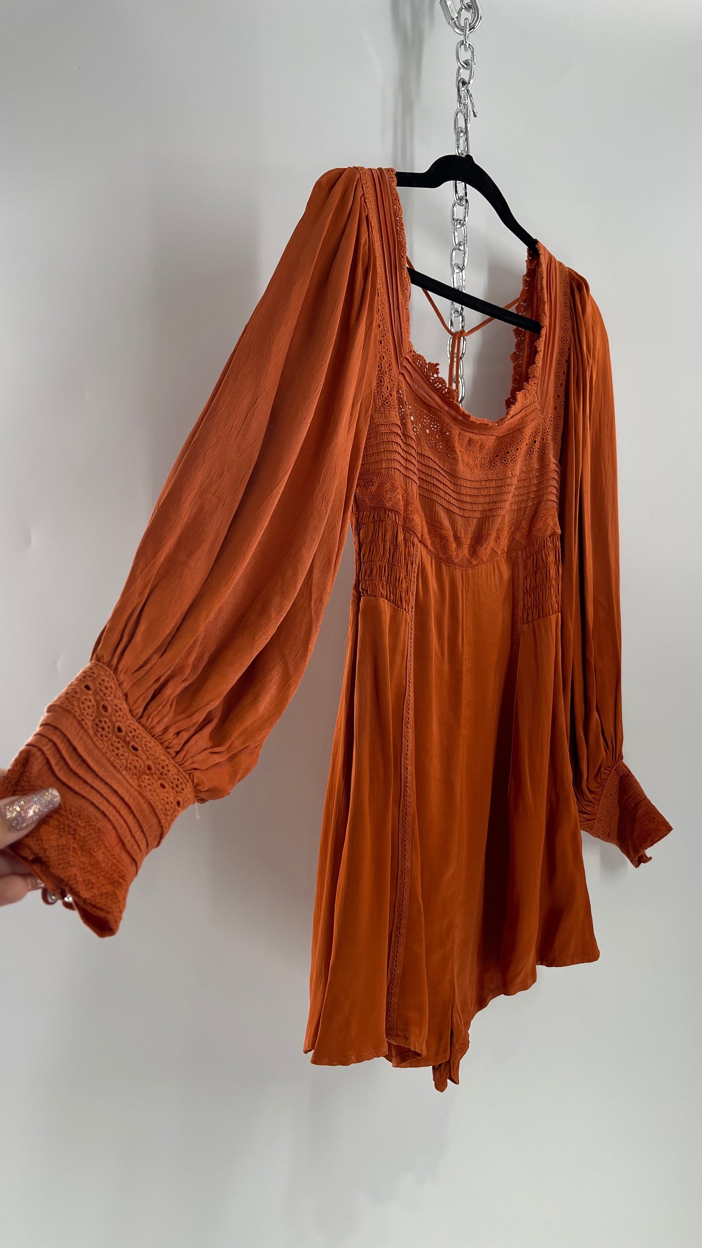 Free People Silky Orange Romper with Buttoned Sleeve Cuffs, Balloon Sleeves and Pleated Lace Bust (2)