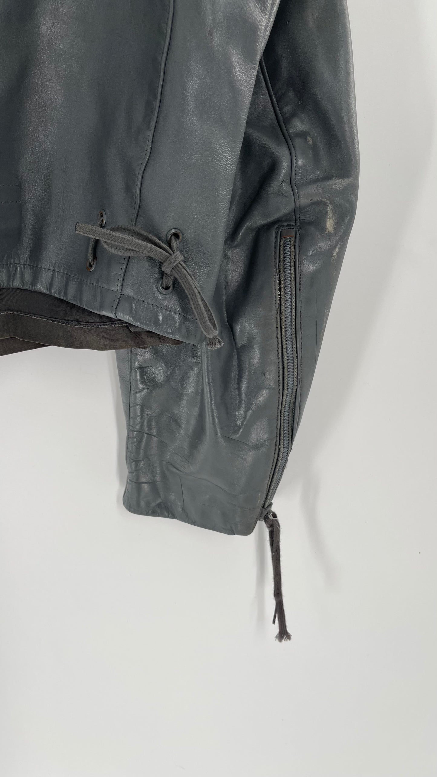 Vintage Grey Leather Cropped Jacket with Collar, Zippered Forearms, and Laced Up Detailing on Sides Small)