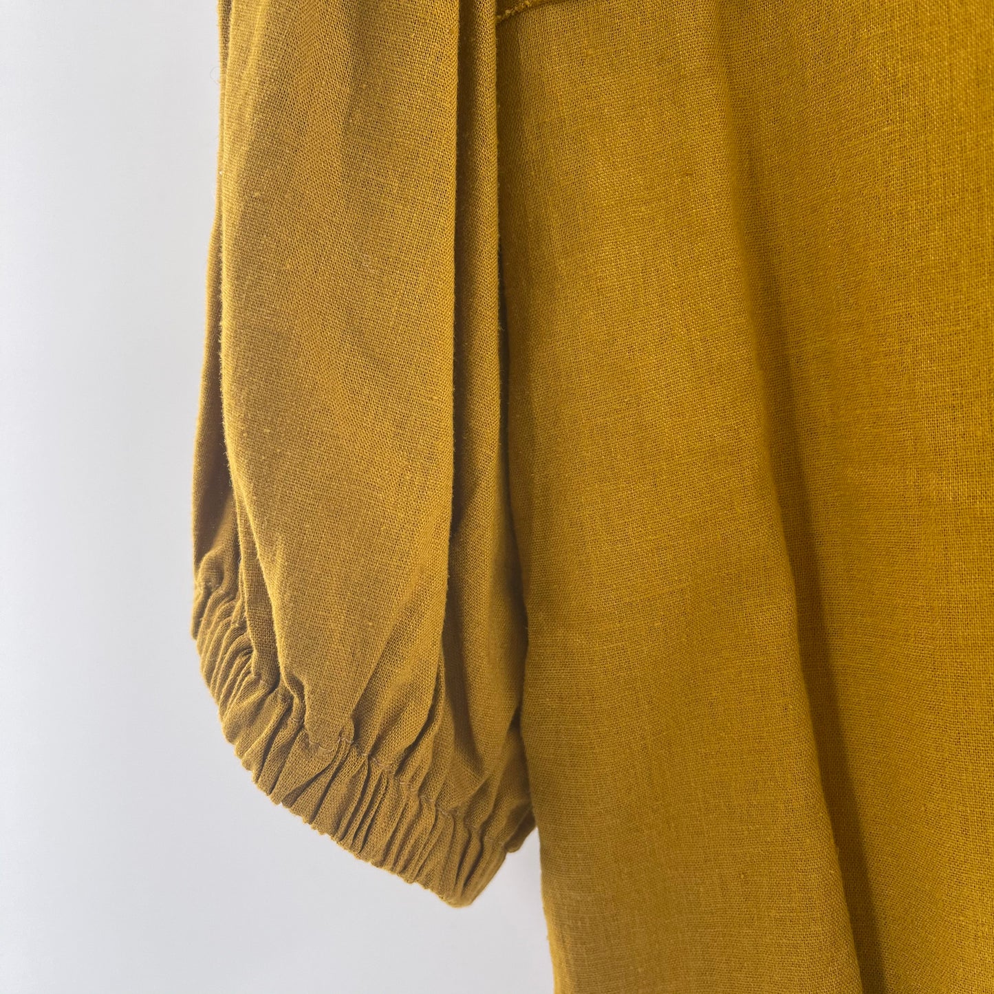 Intimately Free People Short Sleeve Mustard Yellow Bodysuit With Pockets and Wooden Buttons (Size XS)