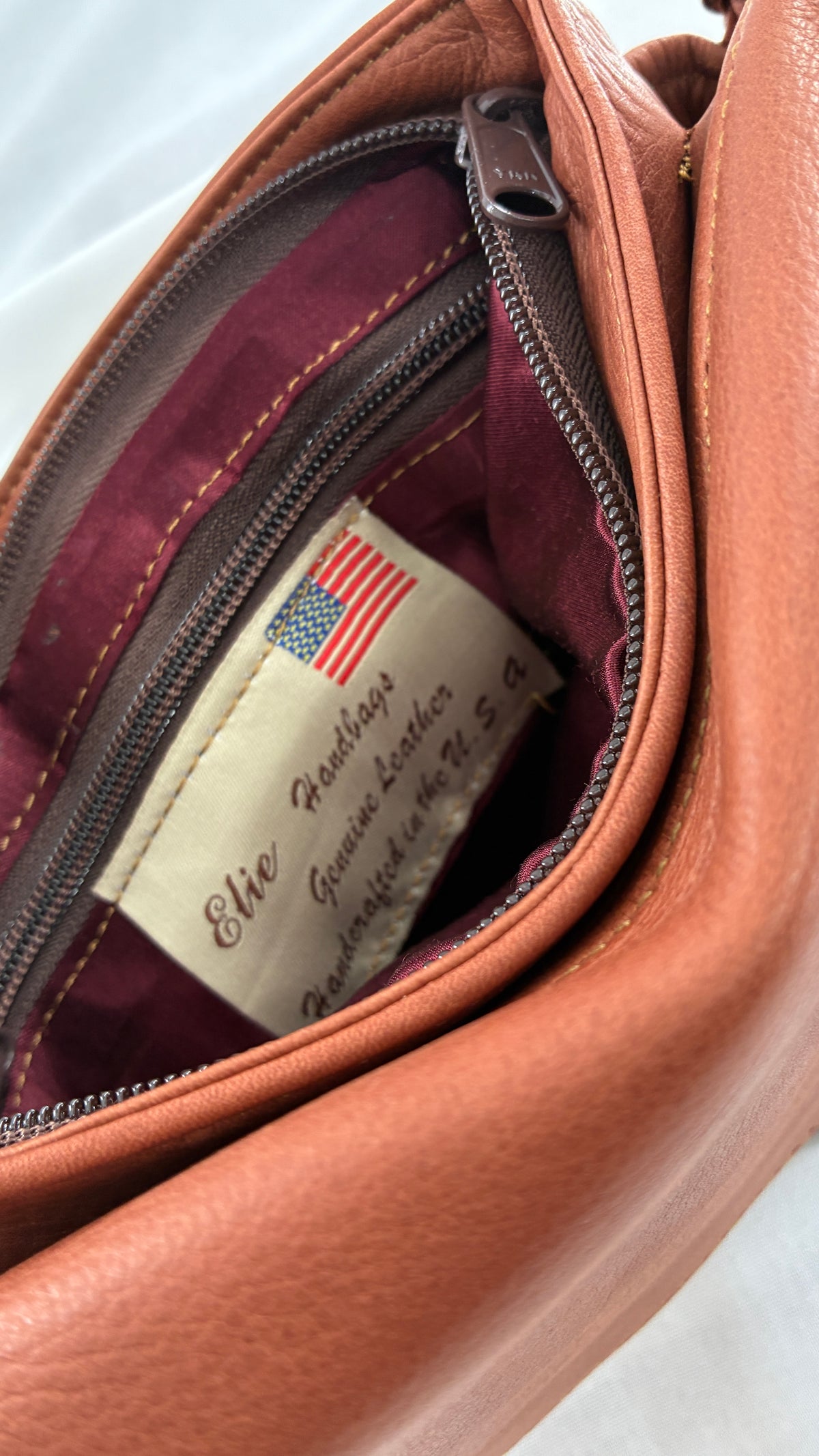 ELIE Genuine Leather Tulip Jr Handbag with Multiple Sections and Zippered Pockets