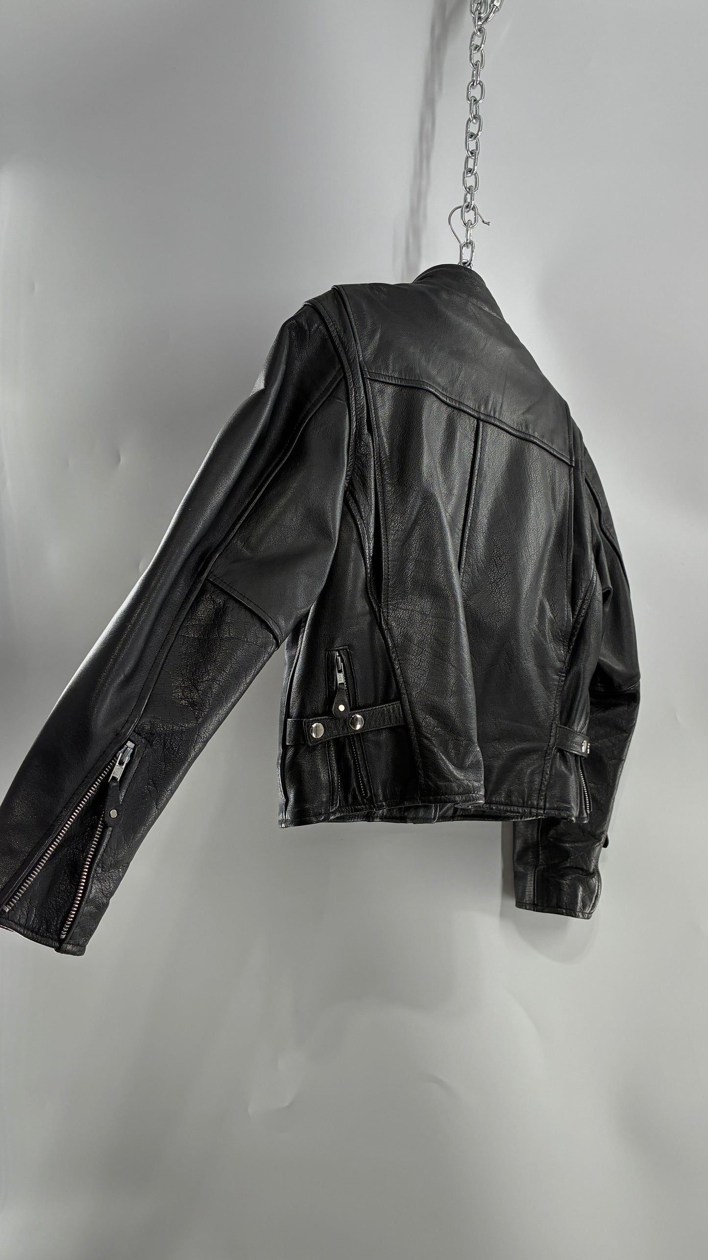 Vintage DOC’s Black Thick Leather Jacket with Removable Quilted Lining, Zippered Sides and Heavy Metal Details (Medium)