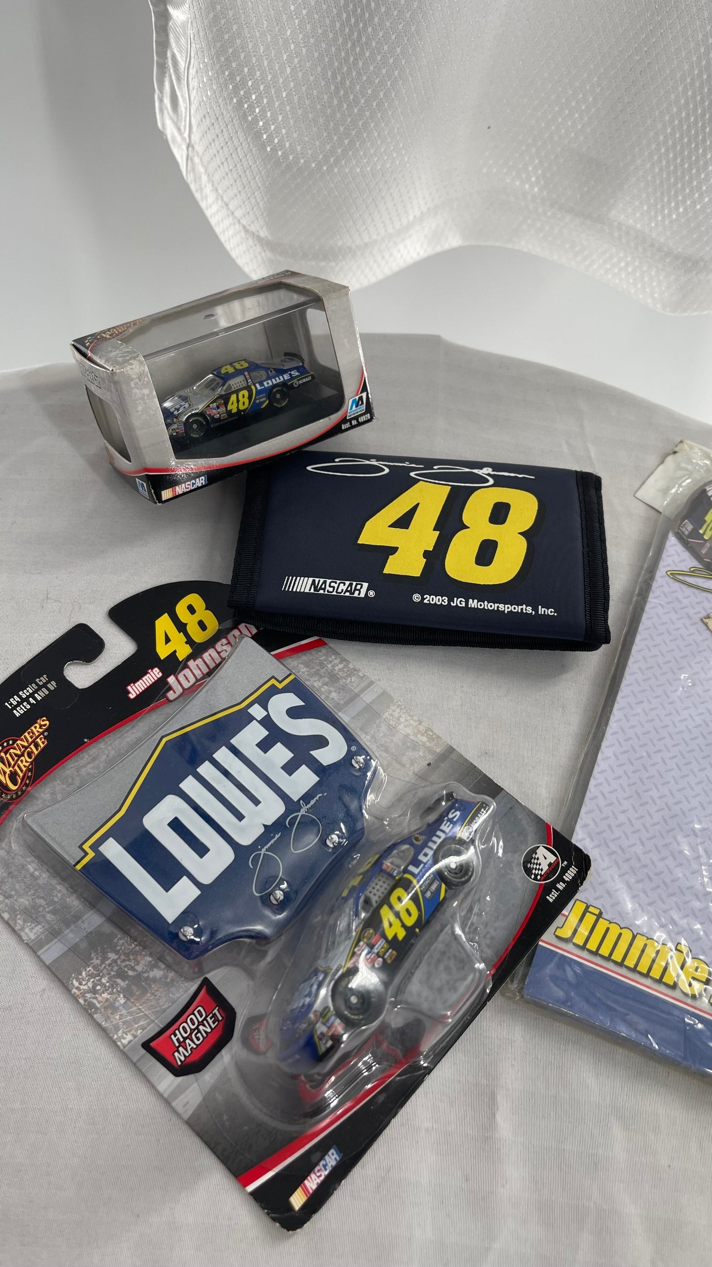 Vintage NASCAR Lowe’s Jimmie Johnson Racer Driver Set: hat, wallet, matchbox cars, notepad and jersey