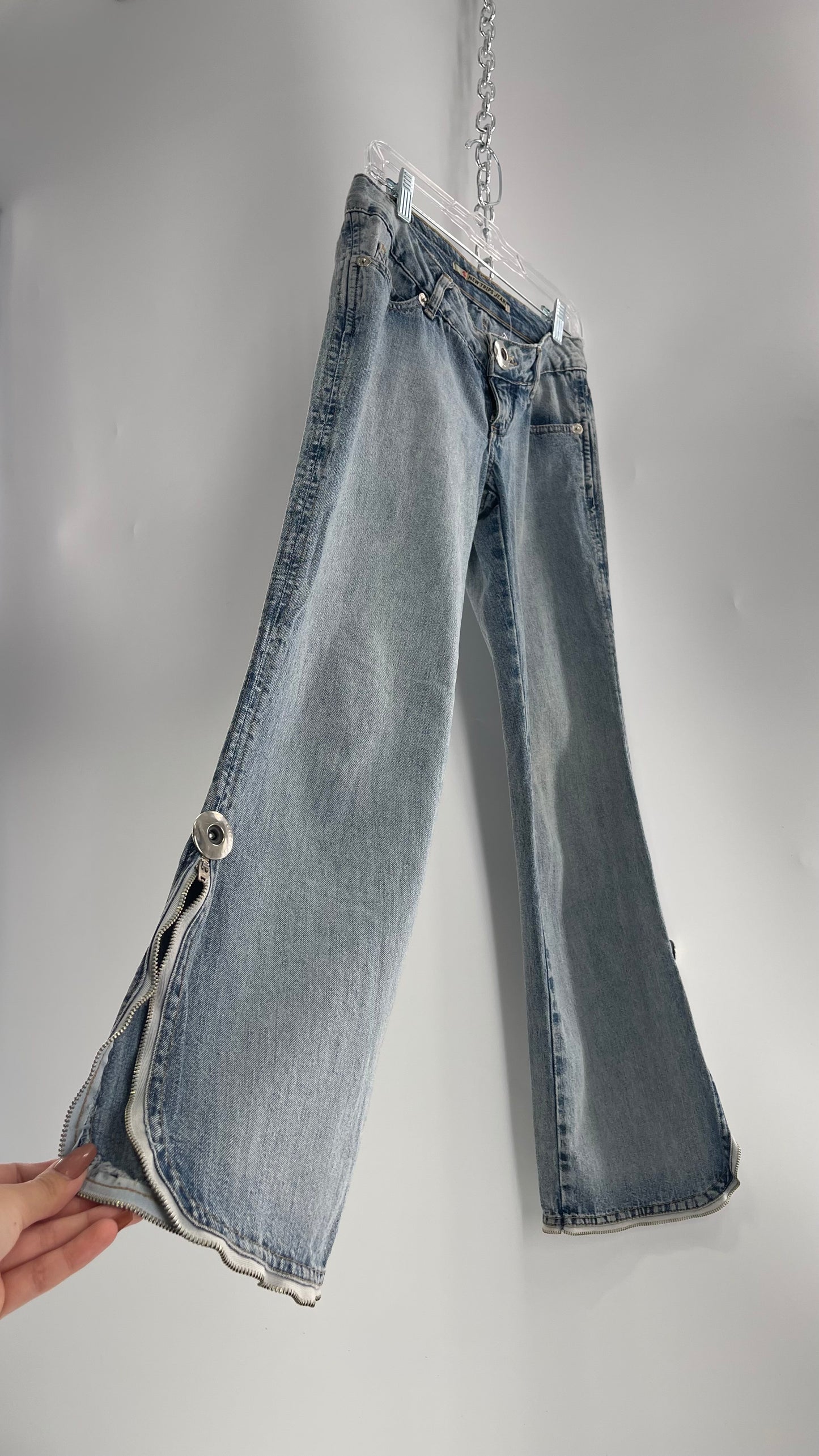 Vintage New Trips Light Wash Kick Flare Jeans with Zipper Hem Detail, V Waistline and Oversized Metal Buttons (40)