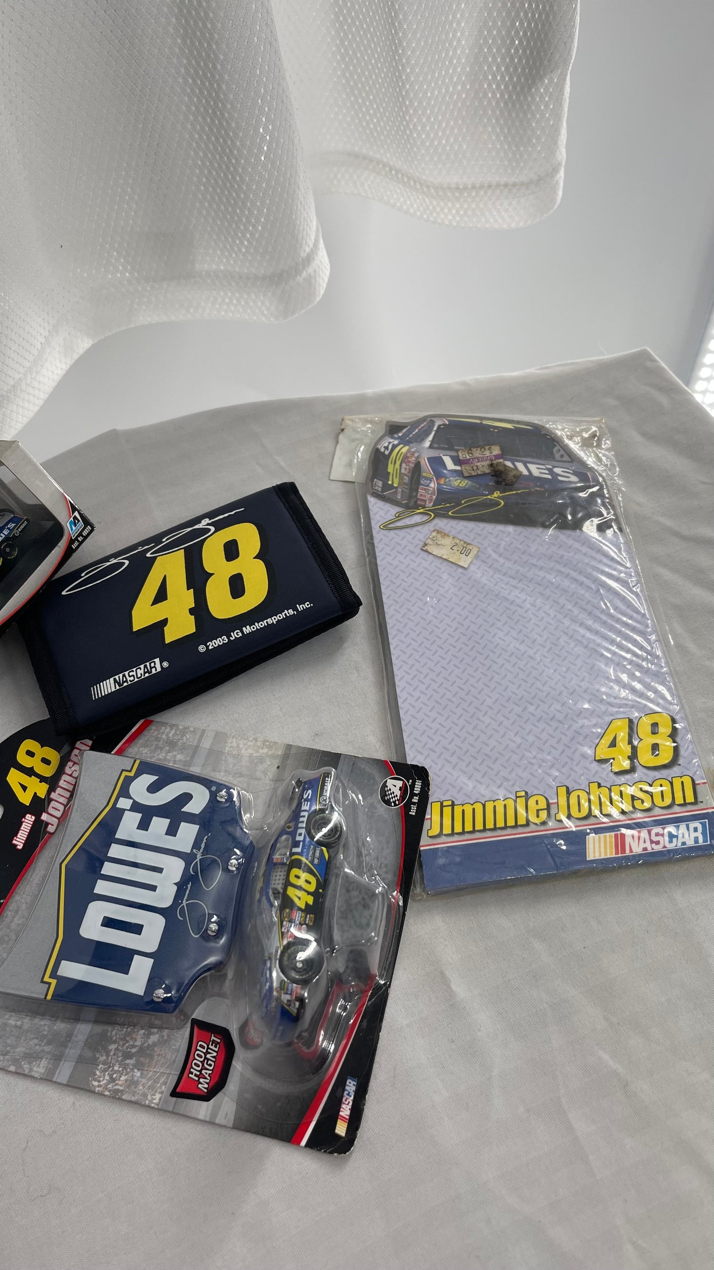 Vintage NASCAR Lowe’s Jimmie Johnson Racer Driver Set: hat, wallet, matchbox cars, notepad and jersey