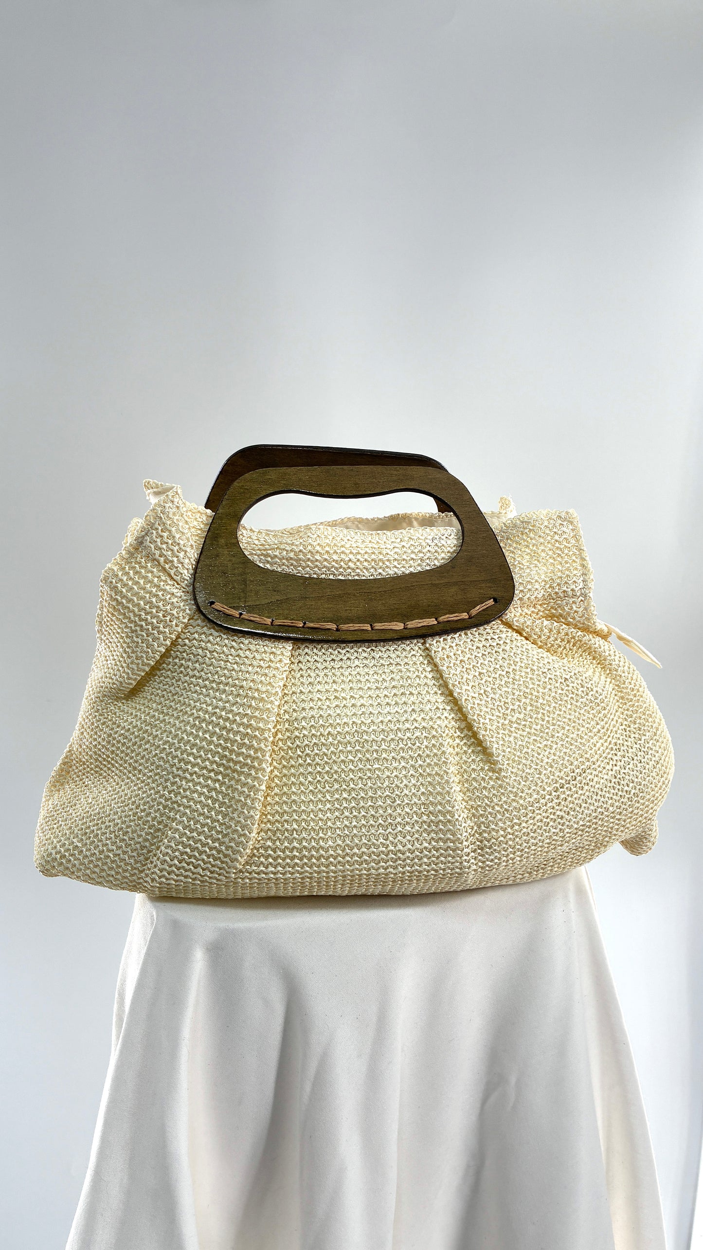 Off White Woven Clutch Bag with Wooden Handle Detail