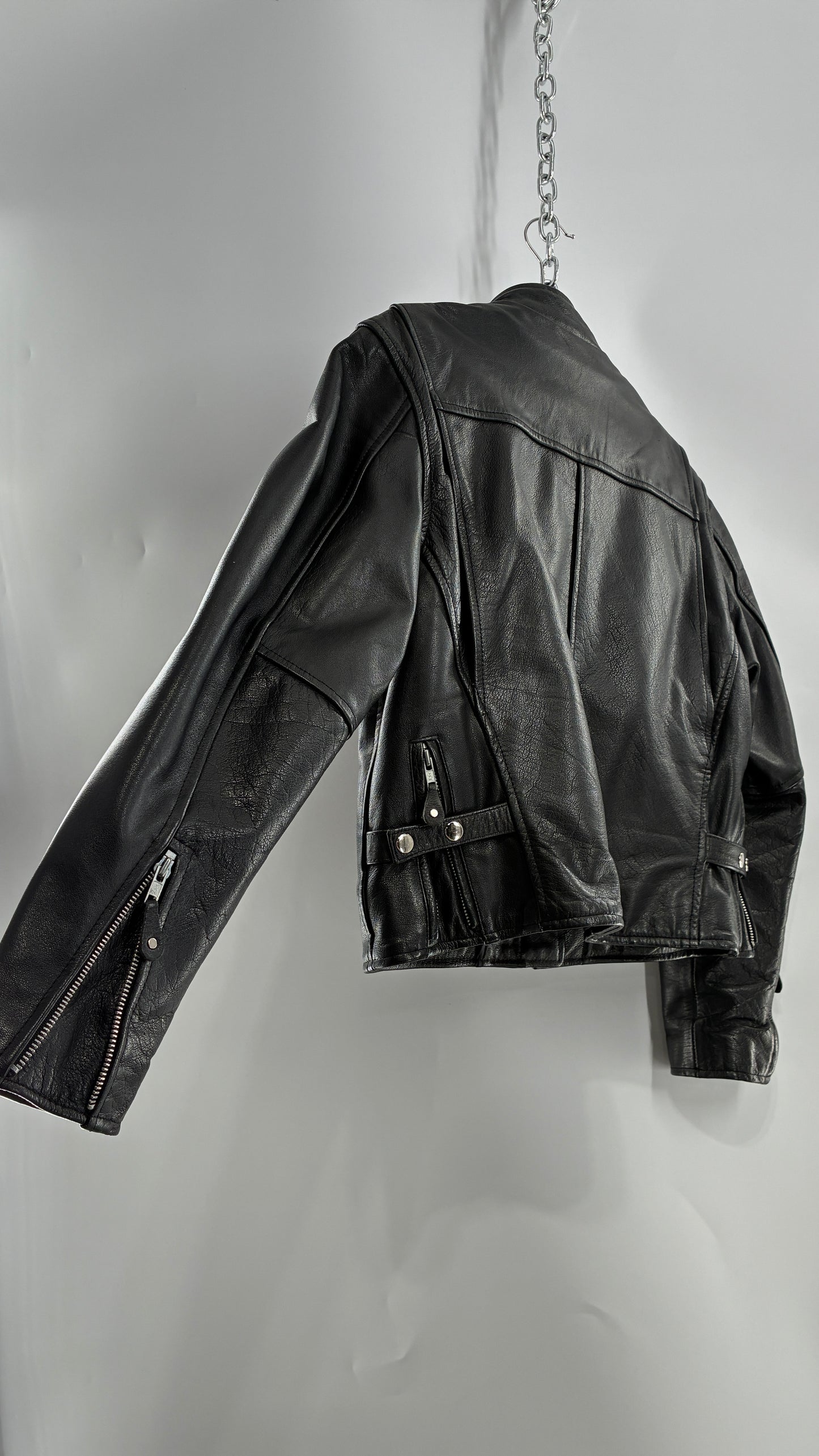 Vintage DOC’s Black Thick Leather Jacket with Removable Quilted Lining, Zippered Sides and Heavy Metal Details (Medium)