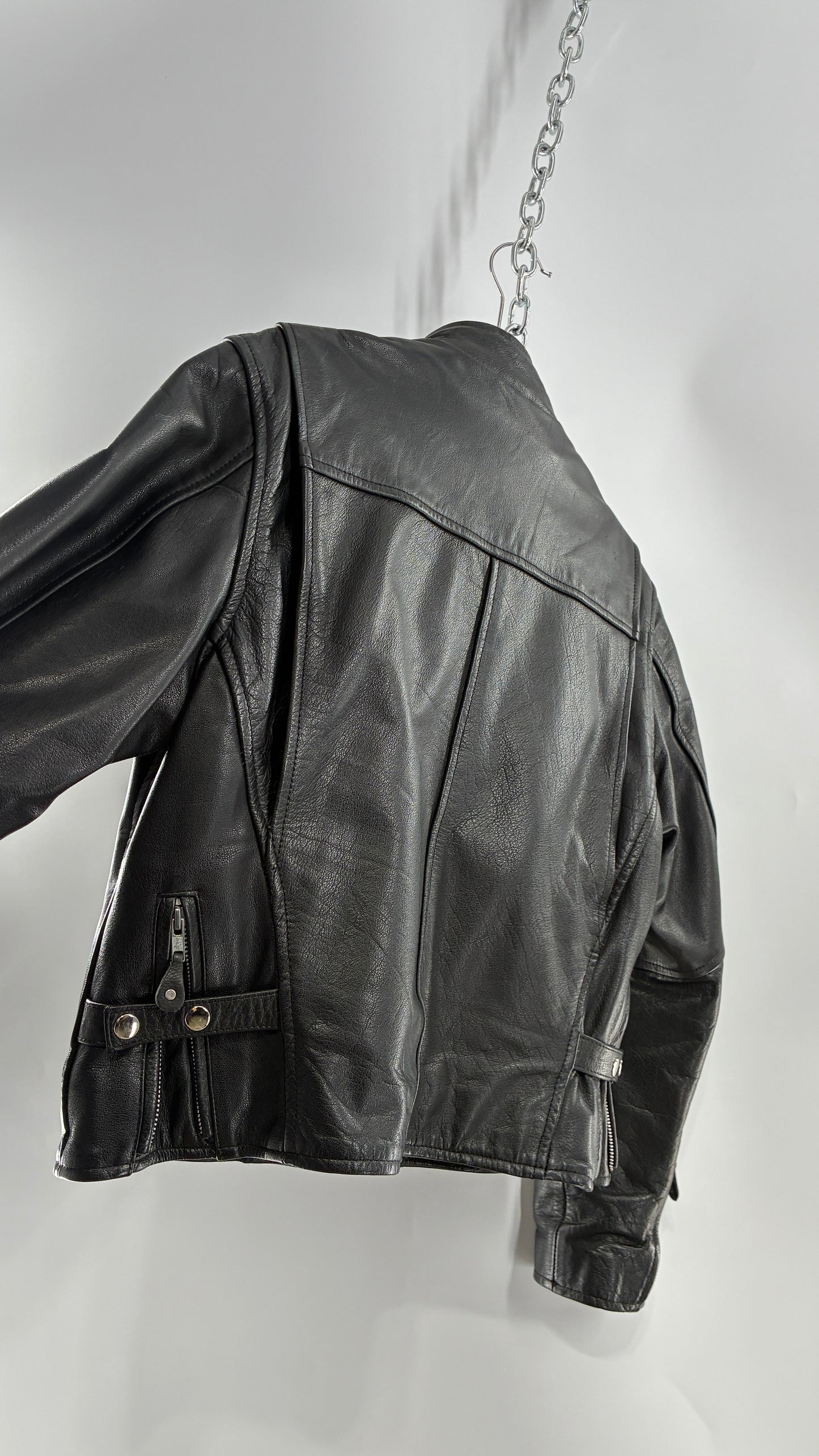 Vintage DOC’s Black Thick Leather Jacket with Removable Quilted Lining, Zippered Sides and Heavy Metal Details (Medium)