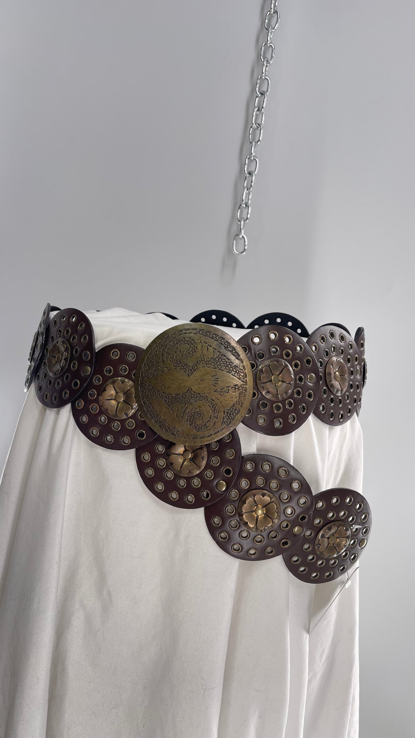 Vintage 1990s Oversized Concho Circle Belt with Grommets and Embossed Metal Flowers (One Size)