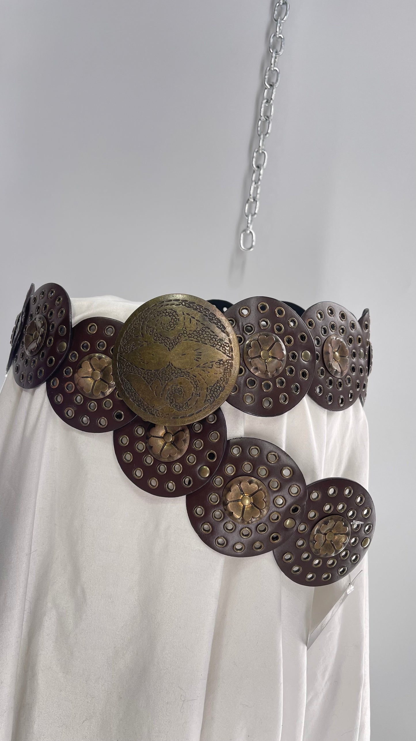 Vintage 1990s Oversized Concho Circle Belt with Grommets and Embossed Metal Flowers (One Size)