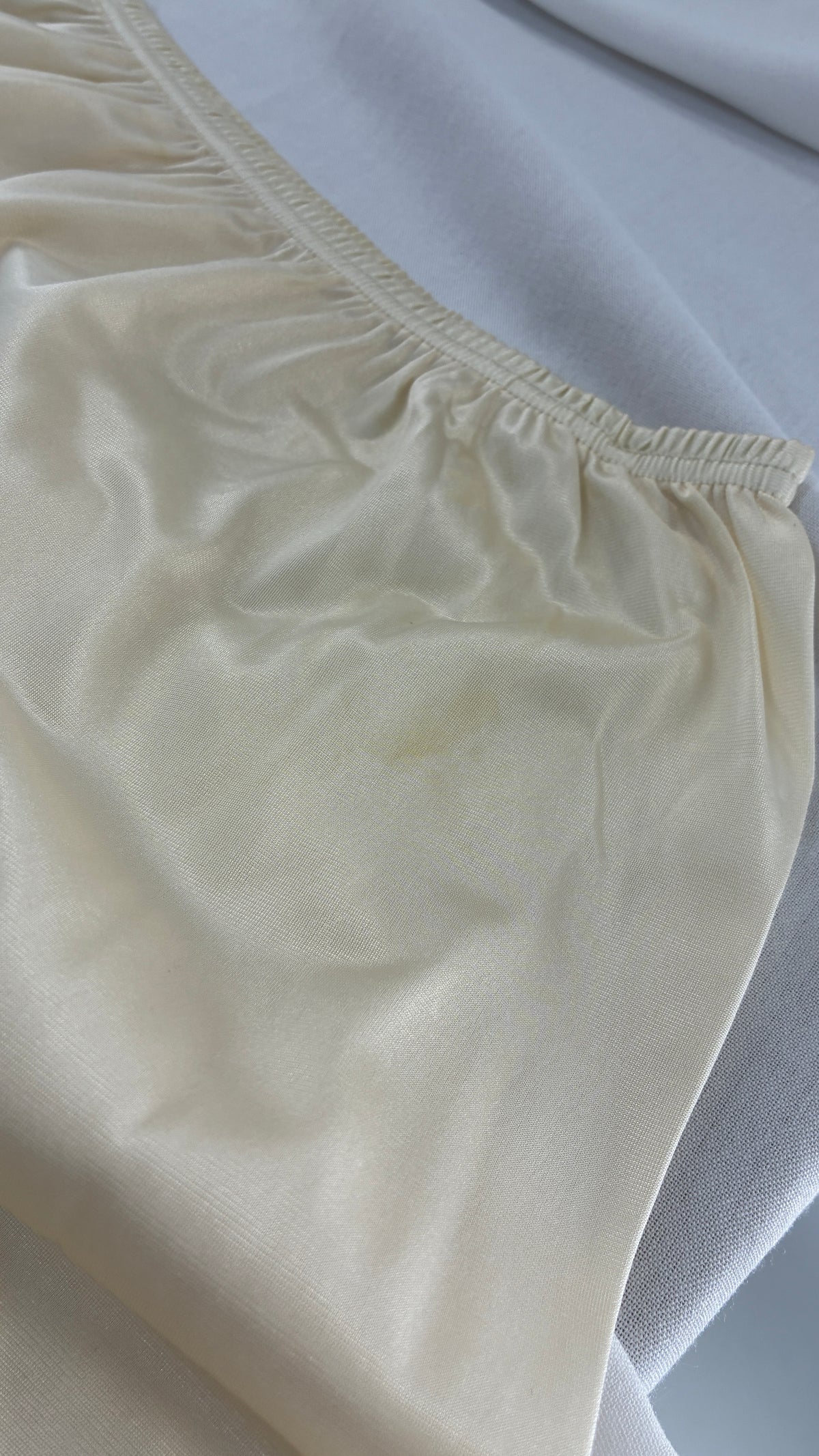 Vintage Vanity Fair Ivory Mini Slip Skirt with Slit and Wide Lace Trim (Medium)