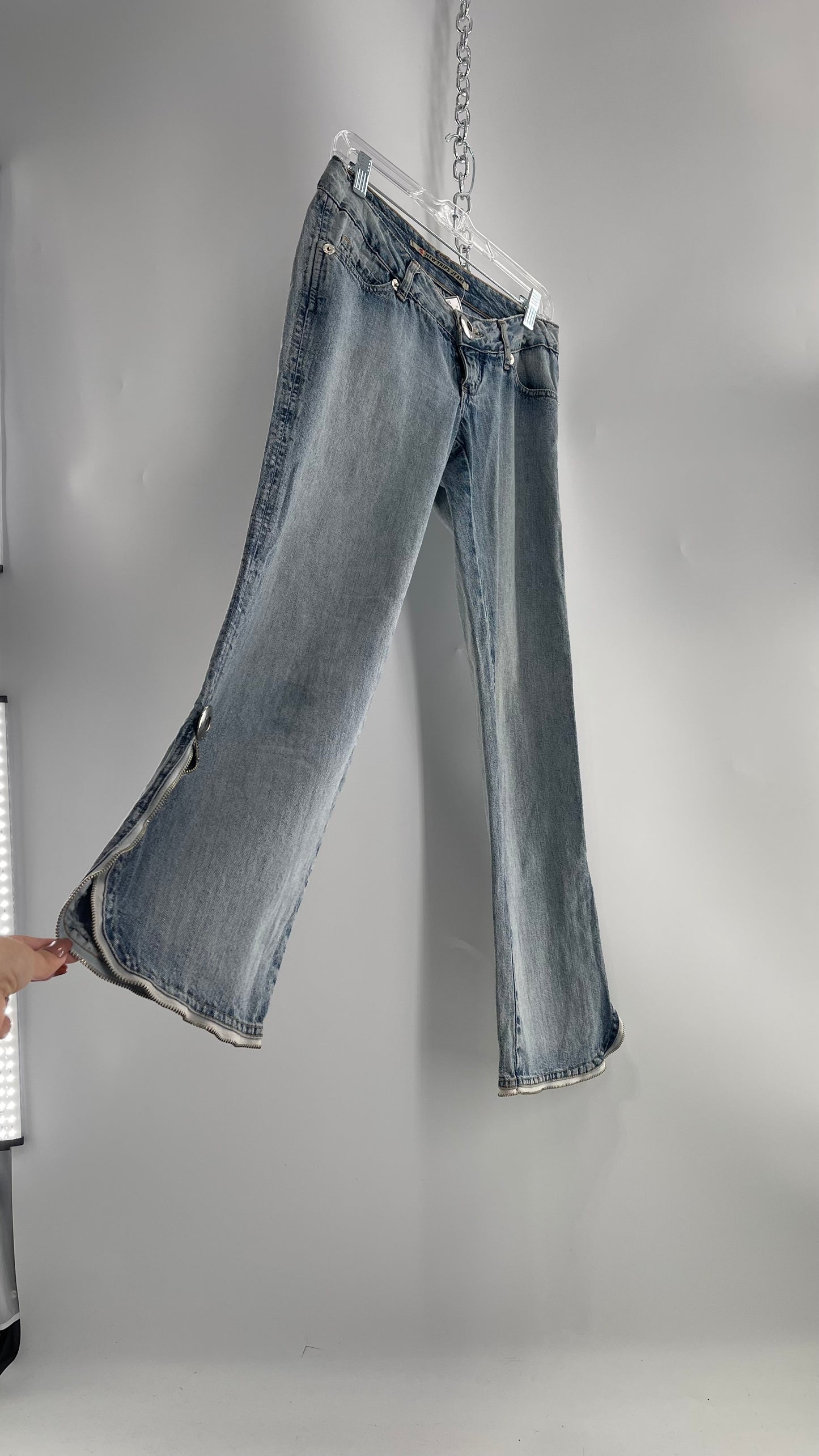 Vintage New Trips Light Wash Kick Flare Jeans with Zipper Hem Detail, V Waistline and Oversized Metal Buttons (40)