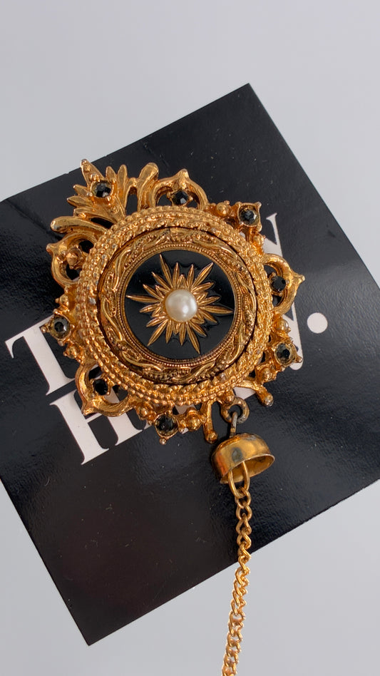 Vintage Victorian Revival Gold Brooch with Black Glass, Starburst Motif, Faux Pearl Centerpiece and Dangling Chain