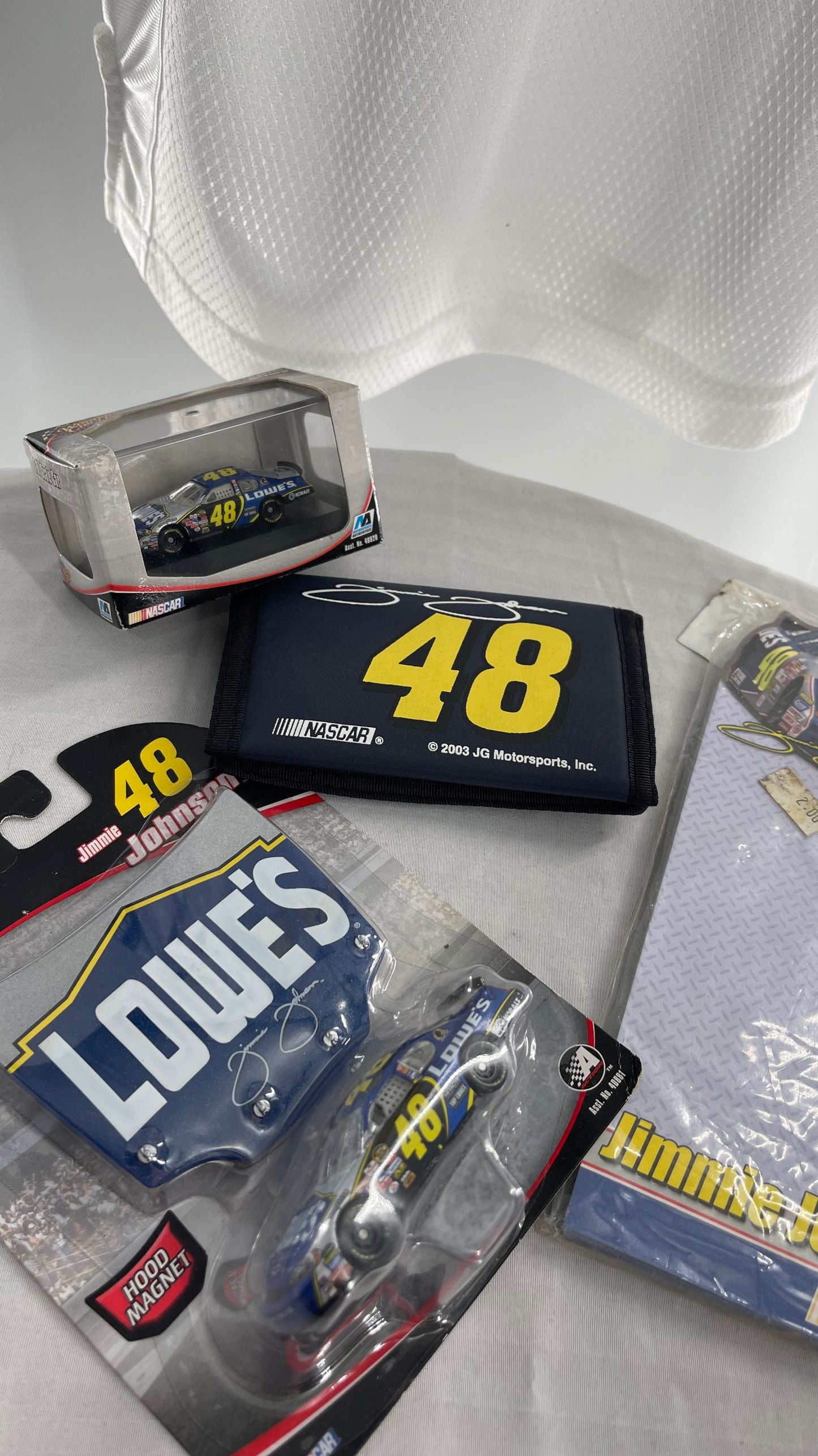 Vintage NASCAR Lowe’s Jimmie Johnson Racer Driver Set: hat, wallet, matchbox cars, notepad and jersey