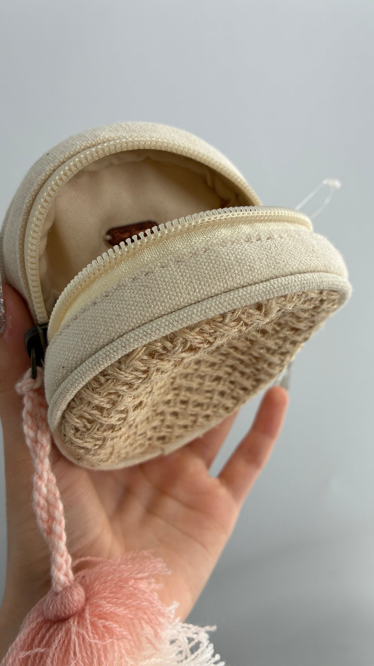 Free People Woven Round Coin Pouch with Tassel Detail