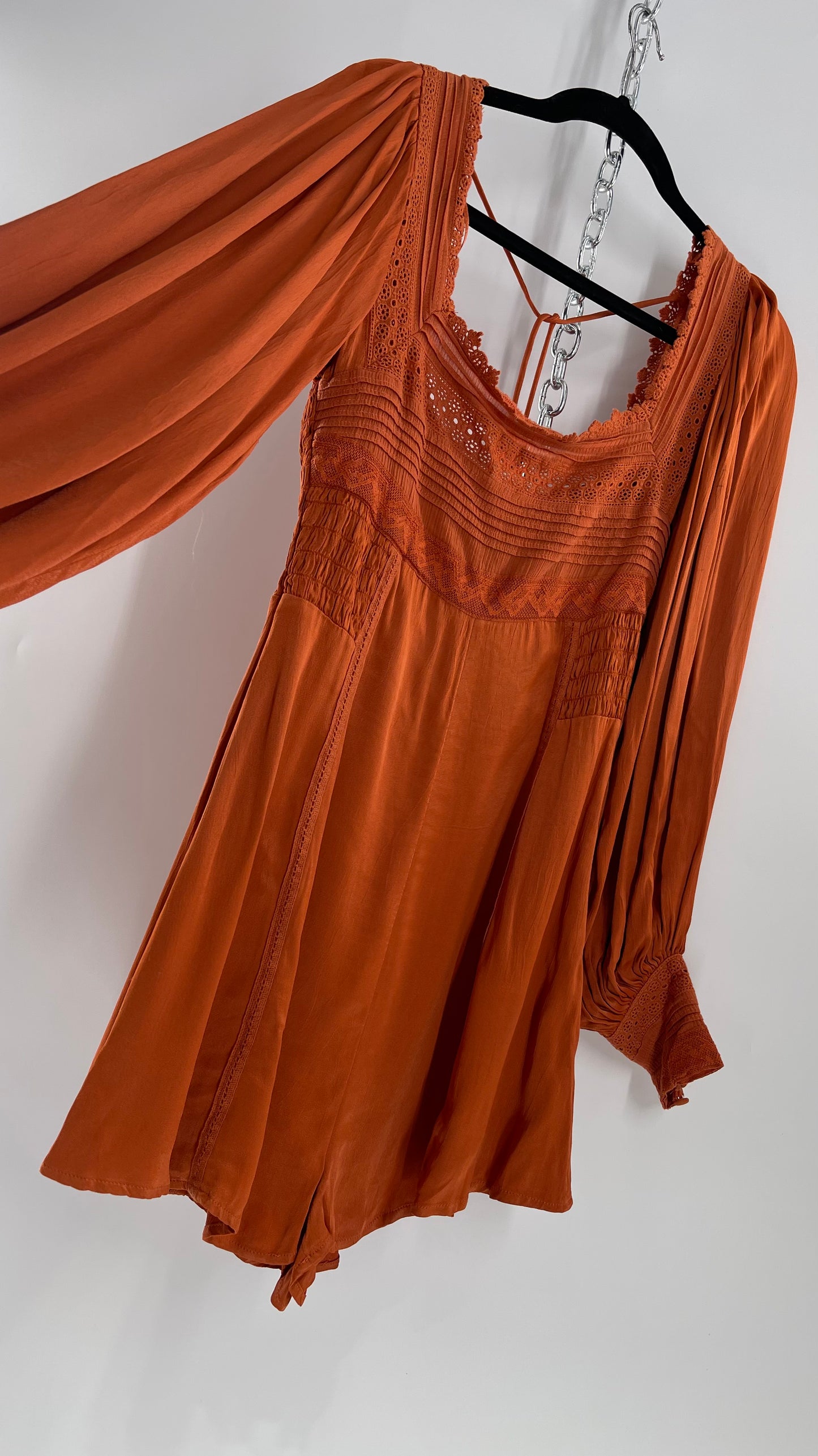 Free People Silky Orange Romper with Buttoned Sleeve Cuffs, Balloon Sleeves and Pleated Lace Bust (2)