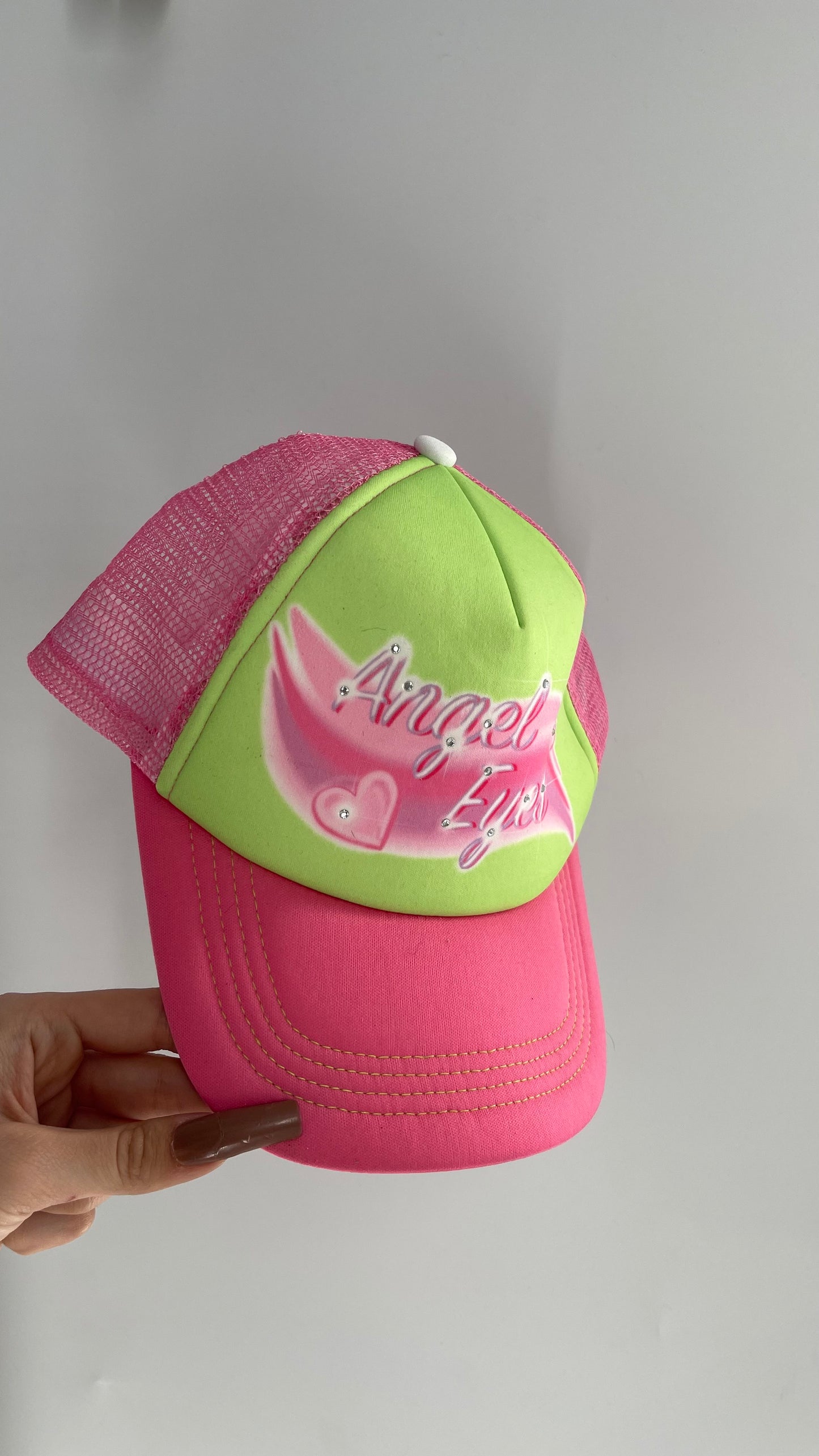 Angel Eyes Pink and Green Airbrush Trucker Hat