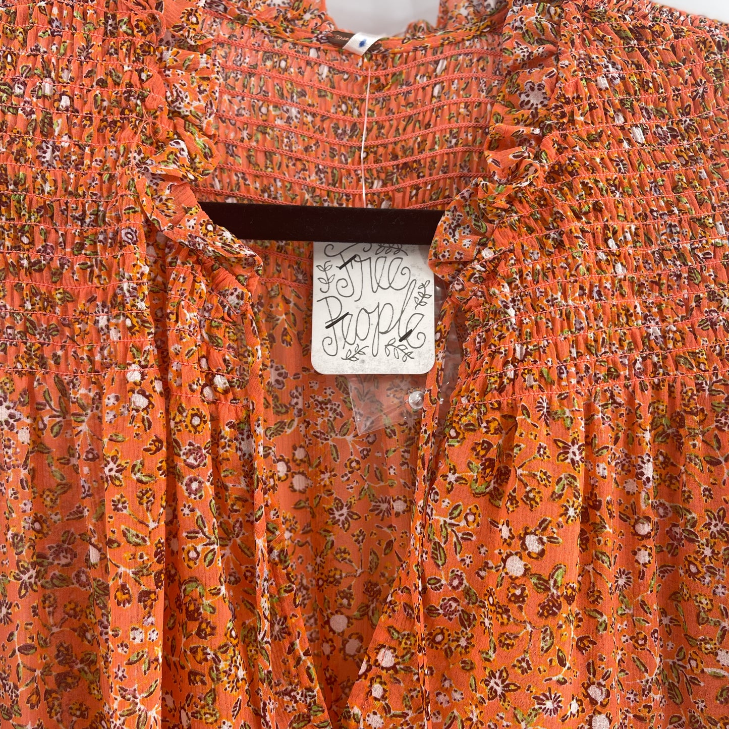 Free people orange floral blouse (S)