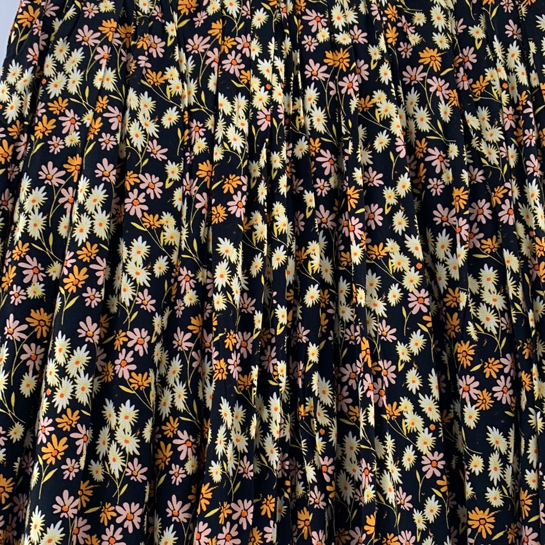 Urban Outfitters Black With Yellow Pink  and Orange Flowers , Small Buttons Details on Front of Mini Skirt ( Size XS)